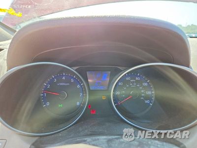 Zdjęcie 9 z 13 samochodu: 2010 HYUNDAI TUCSON GLS VIN:KM8JUCAC6AU042472 - miniatura