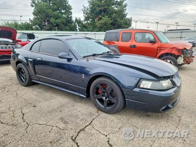 Czwarte zdjęcie samochodu z boku: 1999 FORD MUSTANG COBRA SVT VIN:1FAFP47V4XF197735 - miniatura