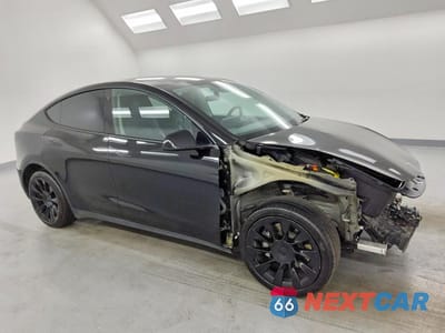 Czwarte zdjęcie samochodu z boku: 2022 TESLA MODEL Y VIN:7SAYGDEE5NF480395 - miniatura