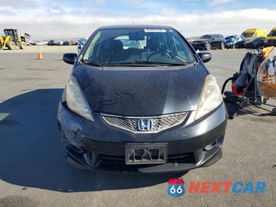 Piąte zdjęcie samochodu w środku: 2010 HONDA FIT SPORT VIN:JHMGE8H47AC031668 - miniatura