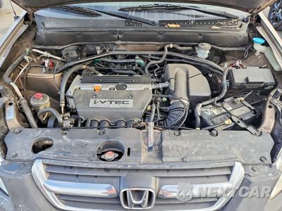 Zdjęcie 11 z 12 samochodu: 2004 HONDA CR-V LX VIN:JHLRD68404C007799 - miniatura