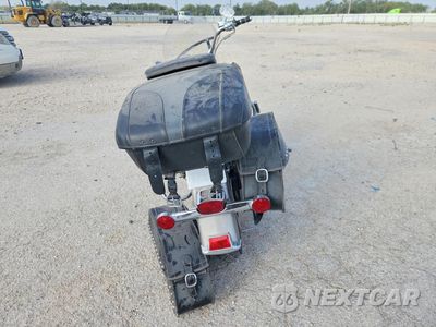 Czwarte zdjęcie samochodu z boku: 1997 HARLEY-DAVIDSON FLSTC VIN:1HD1BJL4XVY035462 - miniatura