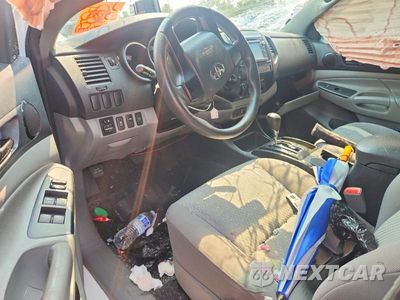 Zdjęcie 8 z 12 samochodu: 2014 TOYOTA TACOMA V6 VIN:3TMLU4EN6EM135713 - miniatura