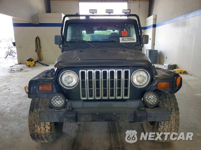 Piąte zdjęcie samochodu w środku: 1999 JEEP WRANGLER / TJ SAHARA VIN:1J4FY49S4XP460580 - miniatura