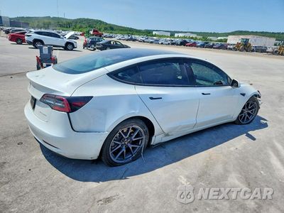 Trzecie zdjęcie samochodu z tyłu: 2021 TESLA MODEL 3 VIN:5YJ3E1EB3MF980622 - miniatura