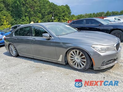 Czwarte zdjęcie samochodu z boku: 2016 BMW 740 I VIN:WBA7E2C5XGG714526 - miniatura