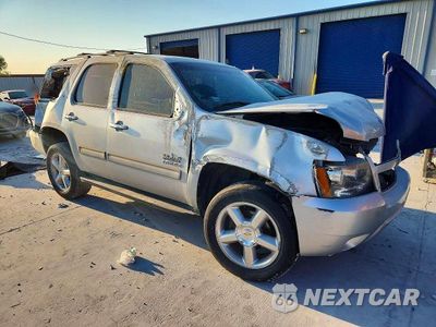 Czwarte zdjęcie samochodu z boku: 2012 CHEVROLET TAHOE C1500 LT VIN:1GNSCBE0XCR324908 - miniatura