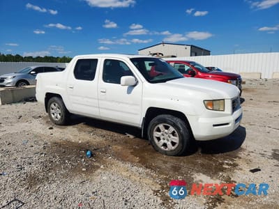Czwarte zdjęcie samochodu z boku: 2006 HONDA RIDGELINE RTL VIN:2HJYK16506H527025 - miniatura