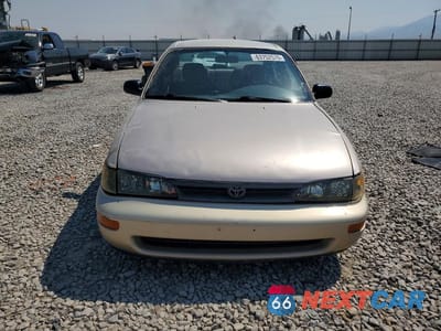 Piąte zdjęcie samochodu w środku: 1994 TOYOTA COROLLA DX VIN:1NXAE09B6RZ204099 - miniatura