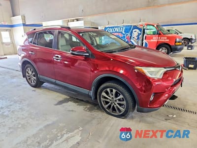 Czwarte zdjęcie samochodu z boku: 2018 TOYOTA RAV4 LIMITED VIN:JTMDFREV8JD238522 - miniatura
