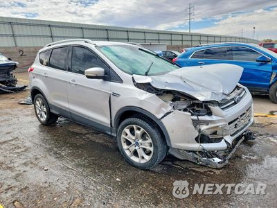 Czwarte zdjęcie samochodu z boku: 2014 FORD ESCAPE TITANIUM VIN:1FMCU9JX9EUB46426 - miniatura