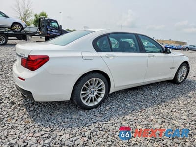 Trzecie zdjęcie samochodu z tyłu: 2015 BMW 750 LXI VIN:WBAYF8C5XFD655160 - miniatura
