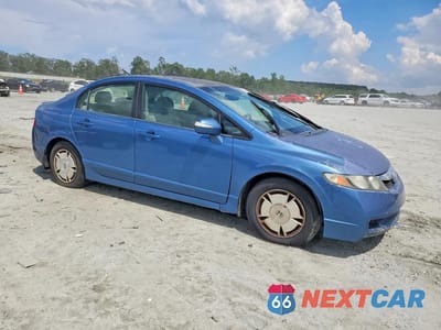 Czwarte zdjęcie samochodu z boku: 2010 HONDA CIVIC HYBRID VIN:JHMFA3F27AS001555 - miniatura