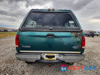 Zdjęcie 6 z 12 samochodu: 1997 FORD F250 VIN:1FTFX28L6VKC43324 - miniatura