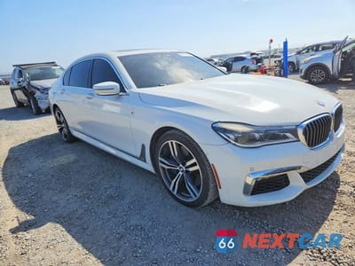 Czwarte zdjęcie samochodu z boku: 2017 BMW 750 I VIN:WBA7F0C50HGM20944 - miniatura