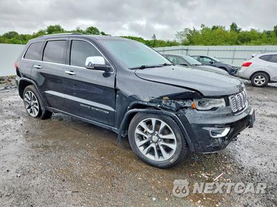 Czwarte zdjęcie samochodu z boku: 2017 JEEP GRAND CHEROKEE OVERLAND VIN:1C4RJFCG3HC684889 - miniatura