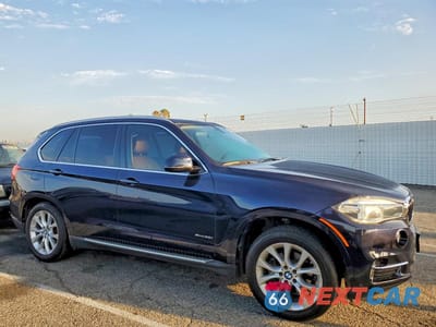 Czwarte zdjęcie samochodu z boku: 2014 BMW X5 XDRIVE35I VIN:5UXKR0C51E0H24052 - miniatura