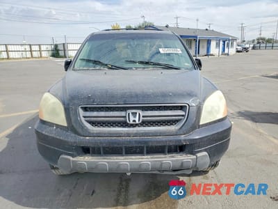Piąte zdjęcie samochodu w środku: 2005 HONDA PILOT EXL VIN:2HKYF18645H525511 - miniatura