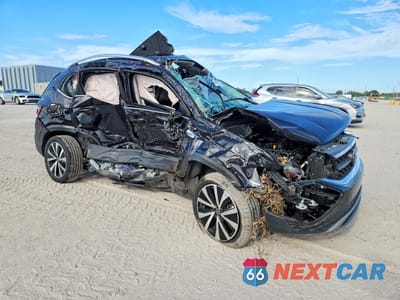 Czwarte zdjęcie samochodu z boku: 2024 VOLKSWAGEN TAOS SE VIN:3VVEX7B25RM005585 - miniatura