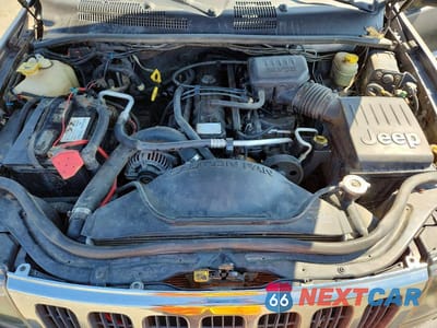 Zdjęcie 12 z 13 samochodu: 1999 JEEP GRAND CHEROKEE LAREDO VIN:1J4GW58S5XC687799 - miniatura