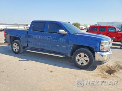Czwarte zdjęcie samochodu z boku: 2016 CHEVROLET SILVERADO K1500 LT VIN:3GCUKREC3GG163797 - miniatura