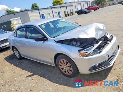 Czwarte zdjęcie samochodu z boku: 2014 VOLKSWAGEN JETTA BASE VIN:3VW1K7AJ5EM319426 - miniatura