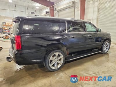 Trzecie zdjęcie samochodu z tyłu: 2015 CHEVROLET SUBURBAN K1500 LTZ VIN:1GNSKKKC7FR123294 - miniatura