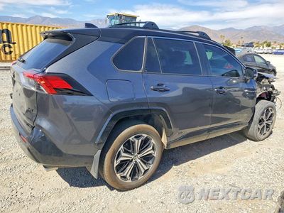 Trzecie zdjęcie samochodu z tyłu: 2024 TOYOTA RAV4 PRIME XSE VIN:JTMFB3FV4RD207621 - miniatura