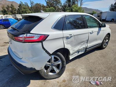Trzecie zdjęcie samochodu z tyłu: 2021 FORD EDGE SEL VIN:2FMPK3J96MBA61974 - miniatura