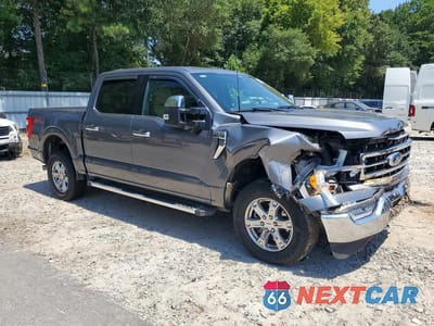 Czwarte zdjęcie samochodu z boku: 2023 FORD F150 SUPERCREW VIN:1FTFW1E80PKF66445 - miniatura