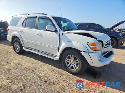 Czwarte zdjęcie samochodu z boku: 2003 TOYOTA SEQUOIA LIMITED VIN:5TDBT48A73S145641 - miniatura