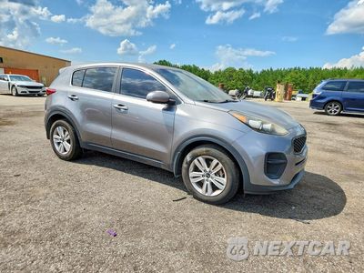 Czwarte zdjęcie samochodu z boku: 2018 KIA SPORTAGE LX VIN:KNDPM3AC0J7335555 - miniatura