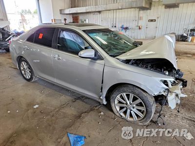 Czwarte zdjęcie samochodu z boku: 2014 TOYOTA CAMRY XLE VIN:4T4BF1FK5ER410820 - miniatura