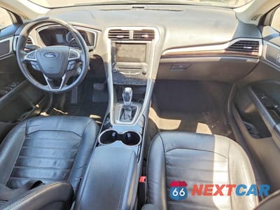 Zdjęcie 8 z 12 samochodu: 2014 FORD FUSION SE PHEV VIN:3FA6P0PUXER256237 - miniatura
