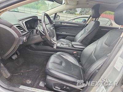 Zdjęcie 7 z 13 samochodu: 2019 FORD FUSION TITANIUM VIN:3FA6P0D97KR240234 - miniatura