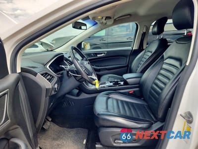 Zdjęcie 7 z 13 samochodu: 2015 FORD EDGE SEL VIN:2FMTK4J81FBB02963 - miniatura