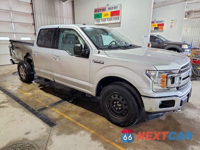 Czwarte zdjęcie samochodu z boku: 2018 FORD F150 SUPERCREW VIN:1FTFW1E53JFE72372 - miniatura