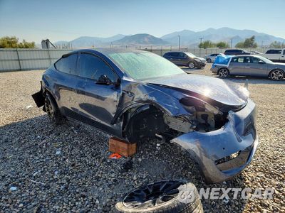 Czwarte zdjęcie samochodu z boku: 2021 TESLA MODEL Y VIN:5YJYGDEE3MF086891 - miniatura