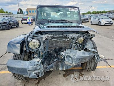 Piąte zdjęcie samochodu w środku: 2014 JEEP WRANGLER UNLIMITED SAHARA VIN:1C4BJWEG6EL296176 - miniatura