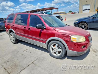 Czwarte zdjęcie samochodu z boku: 2005 PONTIAC MONTANA SV6 VIN:1GMDV33L85D185257 - miniatura