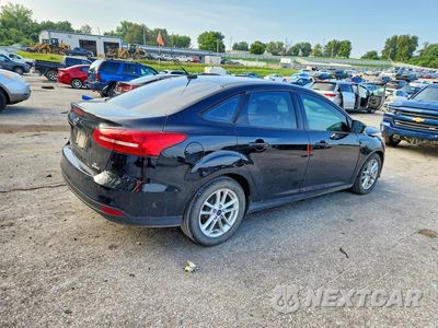 Trzecie zdjęcie samochodu z tyłu: 2016 FORD FOCUS SE VIN:1FADP3F21GL291114 - miniatura
