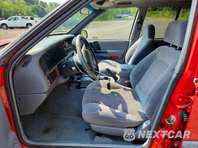 Zdjęcie 7 z 13 samochodu: 1998 JEEP GRAND CHEROKEE LAREDO VIN:1J4GZ58S7WC274370 - miniatura