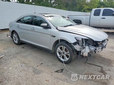 Czwarte zdjęcie samochodu z boku: 2014 FORD TAURUS SEL VIN:1FAHP2E85EG157701 - miniatura
