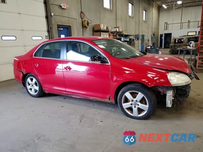 Czwarte zdjęcie samochodu z boku: 2009 VOLKSWAGEN JETTA SE VIN:3VWRM71K59M083520 - miniatura