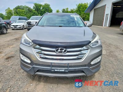 Piąte zdjęcie samochodu w środku: 2014 HYUNDAI SANTA FE SPORT 2.0T VIN:5XYZWDLA2EG219187 - miniatura
