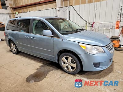 Czwarte zdjęcie samochodu z boku: 2010 VOLKSWAGEN ROUTAN SE VIN:2V4RW3D18AR236967 - miniatura