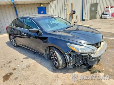 Czwarte zdjęcie samochodu z boku: 2017 NISSAN ALTIMA 2.5 SR VIN:1N4AL3AP6HN315222 - miniatura