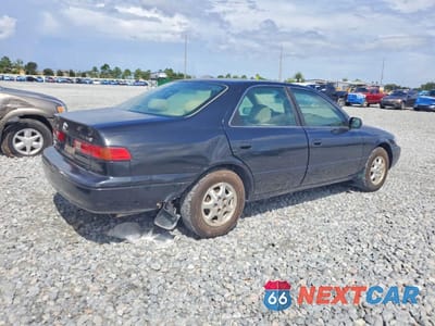 Trzecie zdjęcie samochodu z tyłu: 1999 TOYOTA CAMRY LE VIN:JT2BG22K7X0294174 - miniatura
