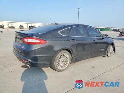 Trzecie zdjęcie samochodu z tyłu: 2014 FORD FUSION TITANIUM HEV VIN:3FA6P0RU1ER336619 - miniatura