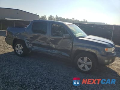 Czwarte zdjęcie samochodu z boku: 2011 HONDA RIDGELINE RTL VIN:5FPYK1F52BB453067 - miniatura